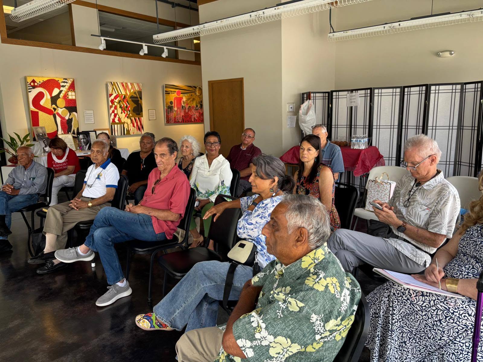 Attendees listen attentively during the peace education and mediation lecture hosted by the Gandhi International Institute for Peace (GIIP) in Honolulu.
