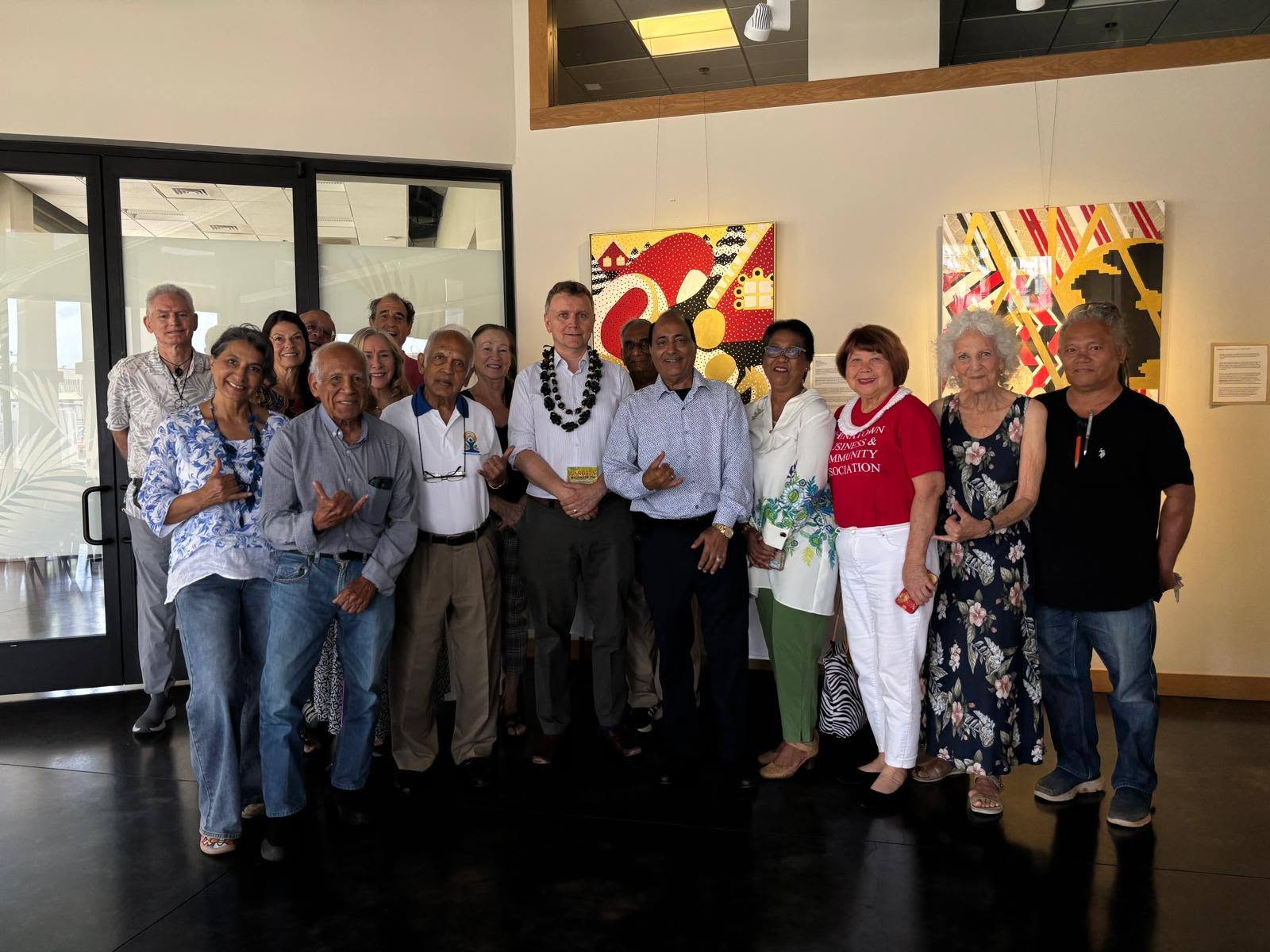 Paul Dziatkowiec with GIIP members and event participants following the lecture in Honolulu.